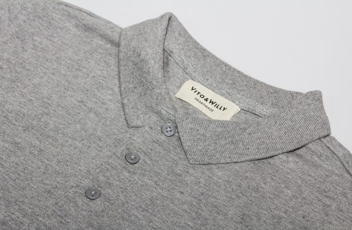 Grey polo shirt on the table