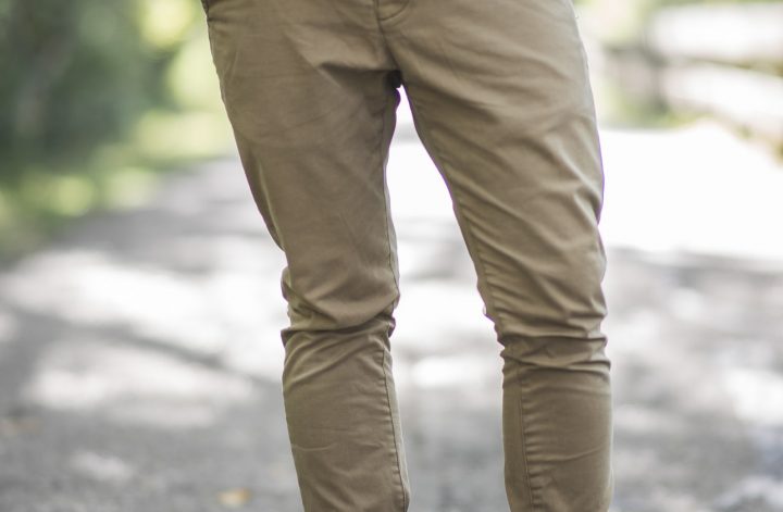 man wearing pants in forest
